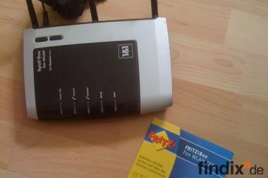 Fritzbox 7270 V2 mit CD und Netzkabel