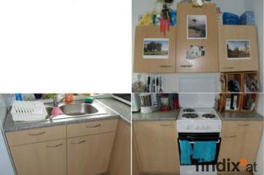 Küche mit E-Herd, Mikrowelle und Spülbecken