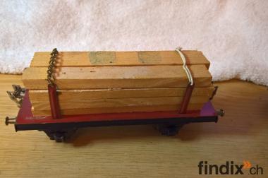Modeleisenbahn Wagon mit Holzladung